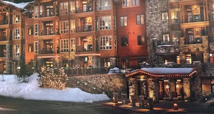 Surrounded by pine trees and mountains