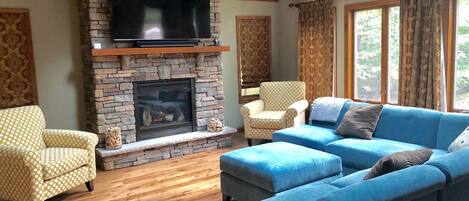 Smart TV, fireplace, foosball, books