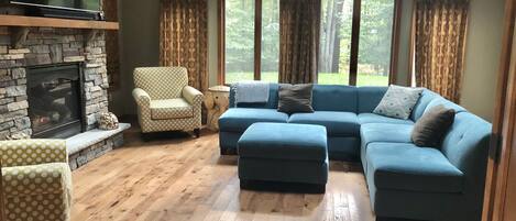 Smart TV, fireplace, table football, books