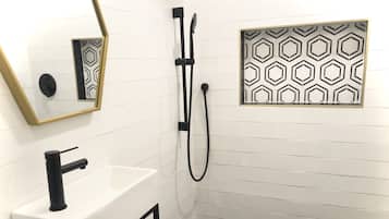 Combined shower/tub, hair dryer, towels, soap