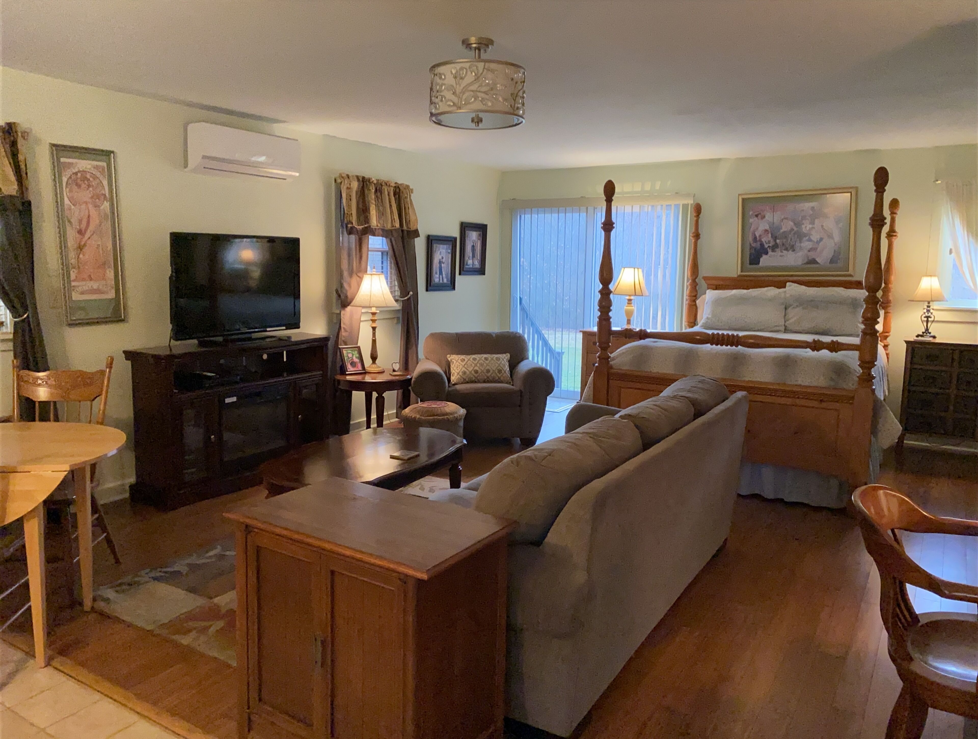 The Willow House Cottage is surrounded by gardens on two private acres. 