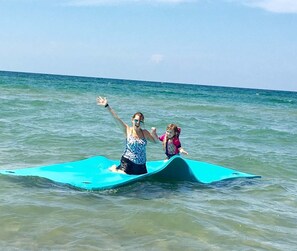 Guests can enjoy surfing and relaxing in the ocean.