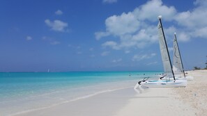 On the beach, sun loungers, beach towels