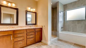 Bathtub, jetted bath, hair dryer, towels
