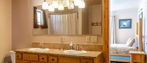 Combined shower/tub, hair dryer, towels, soap