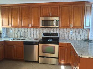 Fridge, microwave, oven, stovetop - Beautiful Atlantic Ocean beach front condo in sunny Florida! (Daytona Beach Shores)