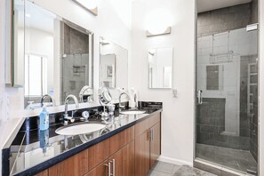 Combined shower/tub, hair dryer, towels, soap
