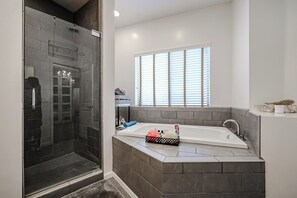 Combined shower/tub, hair dryer, towels, soap