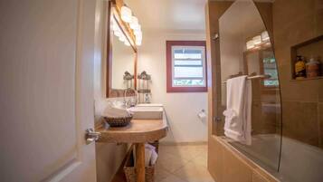 Bathtub, hair dryer, towels