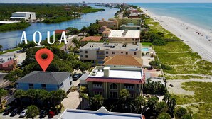 A coastal town with a river, beach, and buildings. - Relax near St. Pete & Clearwater Beaches, stay in our 2-bedroom beach condo (Indian Rocks Beach)