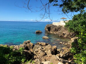 On the beach, sun-loungers, beach towels