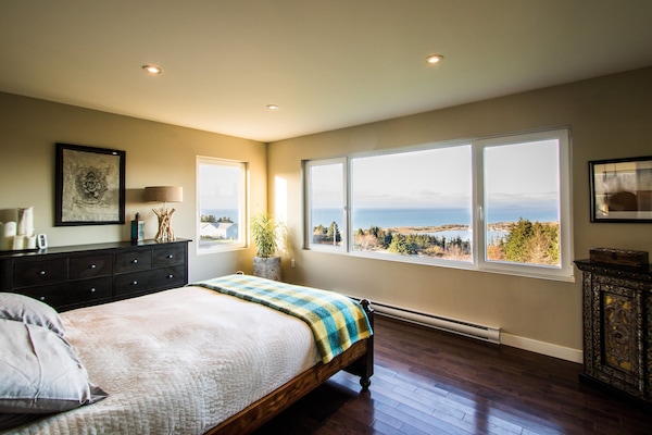 The master bedroom has the best view in the house, overlooking the sea & Cabot