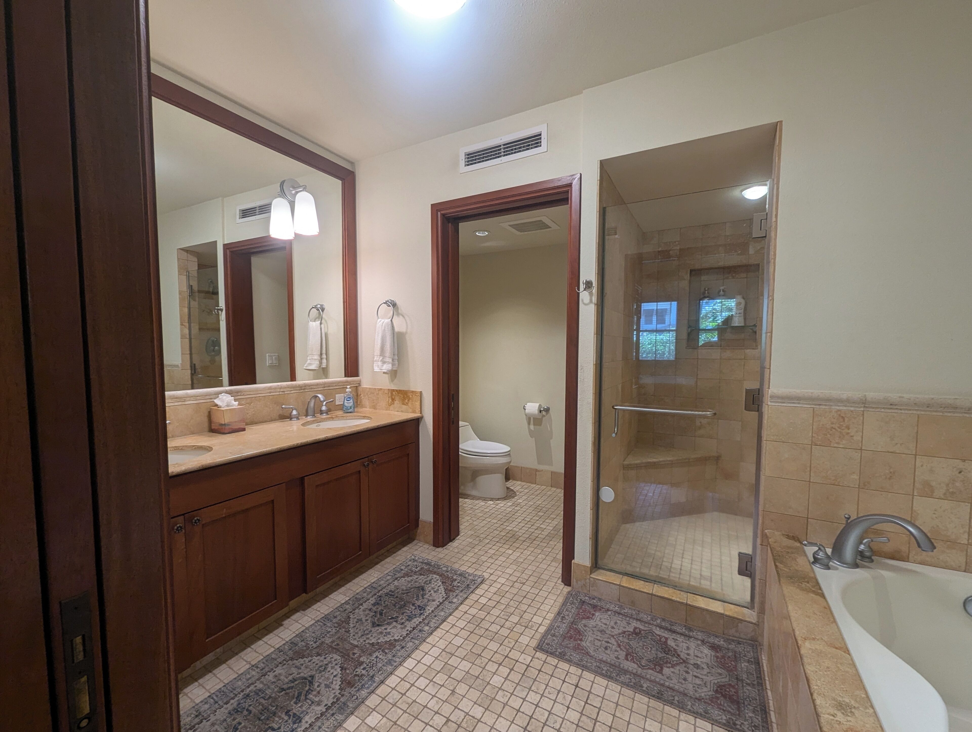 Combined shower/tub, hair dryer, towels, soap