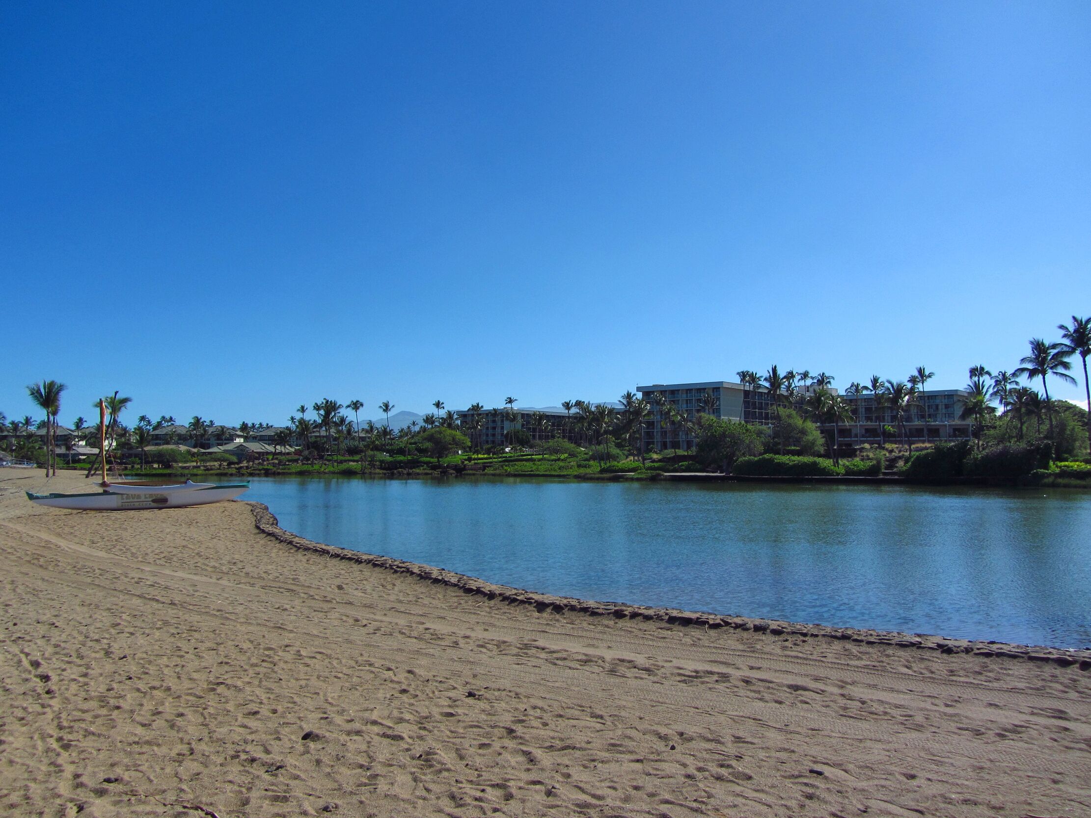 On the beach, sun loungers, beach towels