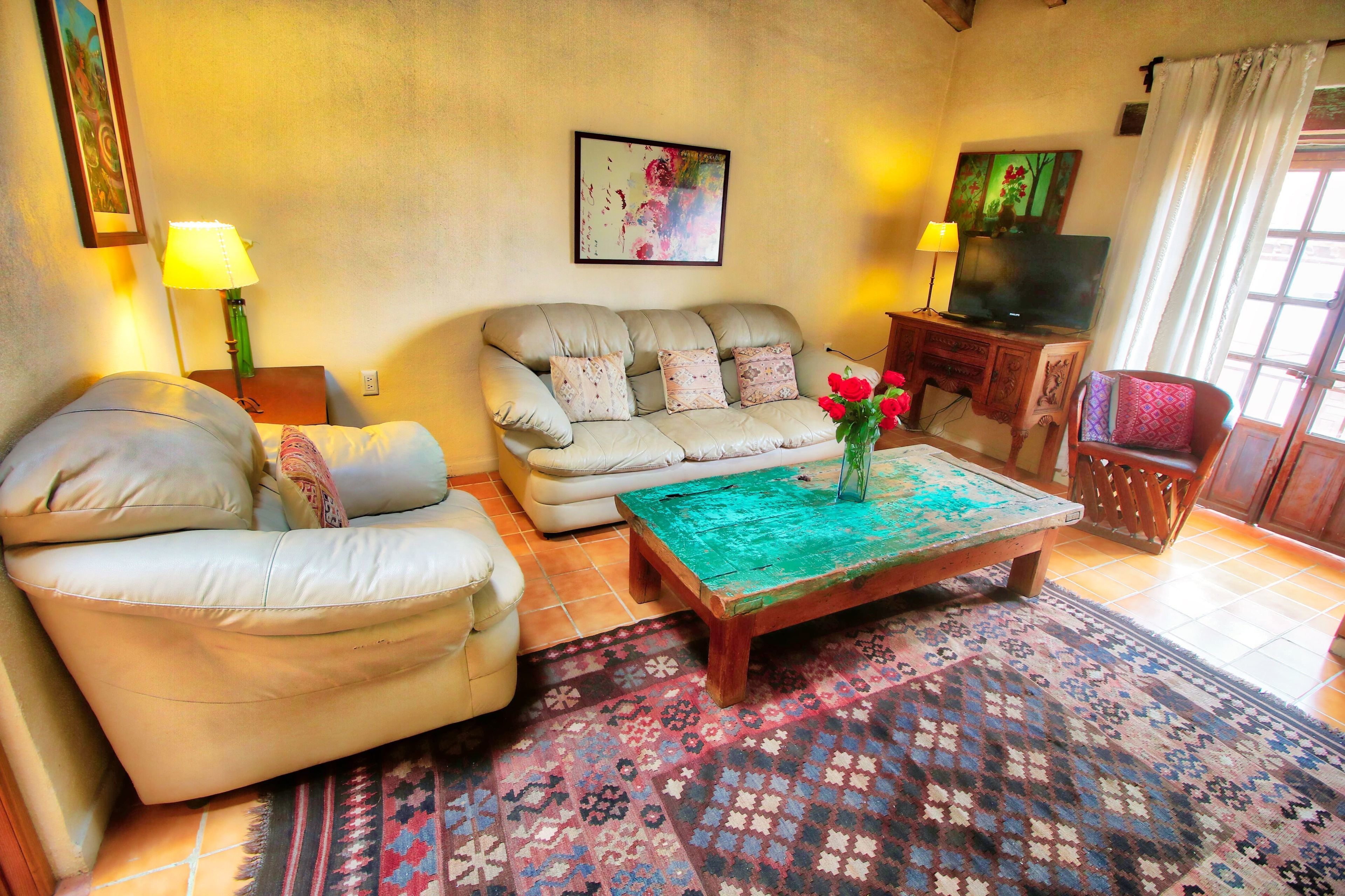 deluxe apartment, multiple beds, non smoking, courtyard view (el sol) | living room | flat-screen tv