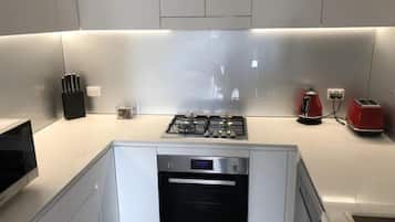 Apartment, 2 Bedrooms, 2 Bathrooms | Private kitchen | Full-size fridge, microwave, oven, stovetop