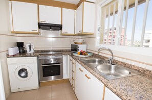 Réfrigérateur, micro-ondes, four, lave-vaisselle