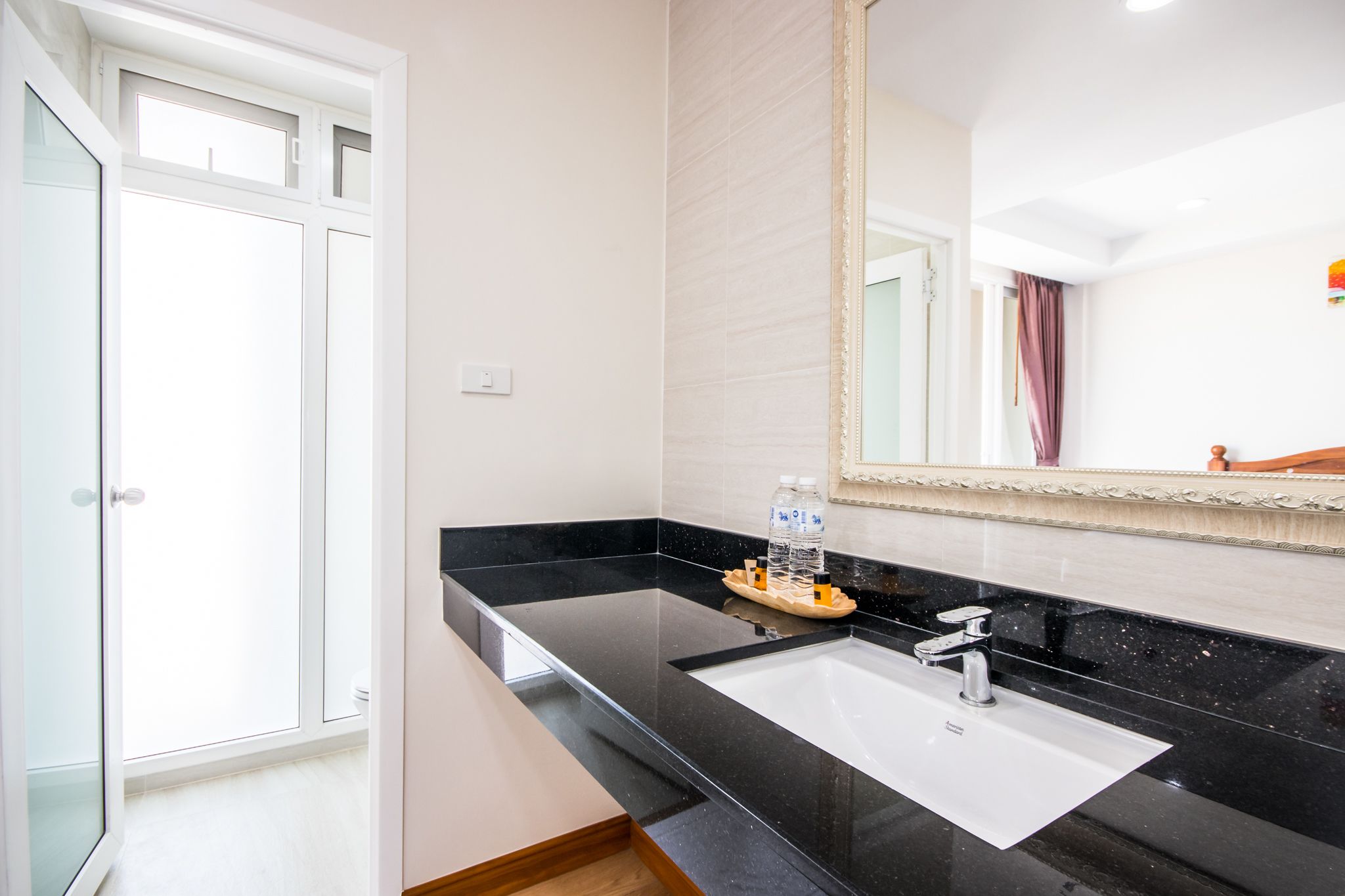 deluxe double bed | bathroom sink