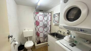 Combined shower/bathtub