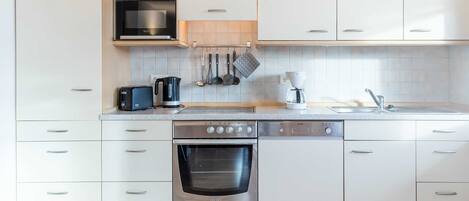 Fridge, microwave, dishwasher, coffee/tea maker