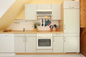 Fridge, microwave, dishwasher, coffee/tea maker