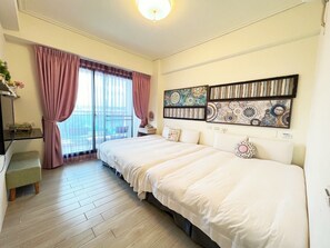 Relax in a serene space with a large bed, bedside tables, and a window with sheer curtains.