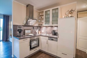 Fridge, dishwasher, espresso maker, coffee/tea maker