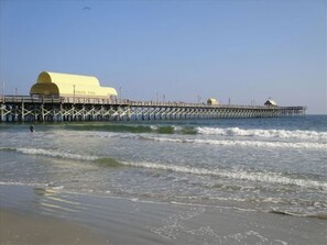 On the beach, sun-loungers