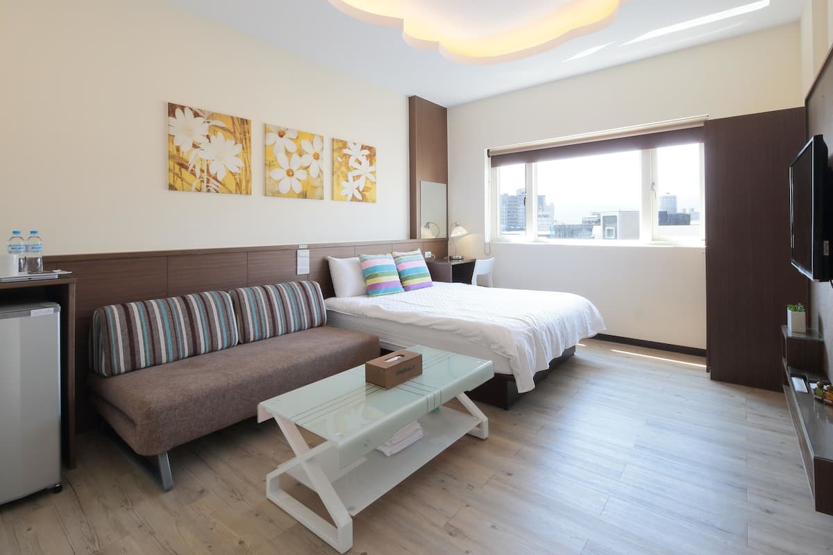 Habitación doble Deluxe | Escritorio, cortinas blackout y insonorización