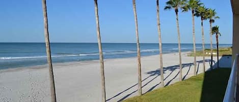 On the beach, sun-loungers, beach towels