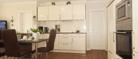 Fridge, microwave, dishwasher, coffee/tea maker