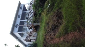 A building with a modern architectural design, featuring a flat roof and multiple windows. - very spacious, neat and organized (Gros Islet)