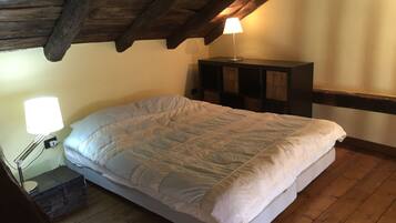 1 bedroom, desk, iron/ironing board, travel crib