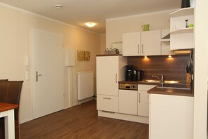 Fridge, dishwasher, coffee/tea maker, electric kettle
