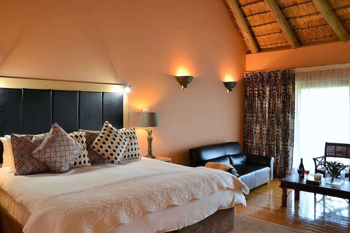 Honeymoon Suite | Premium bedding, in-room safe, desk, laptop workspace