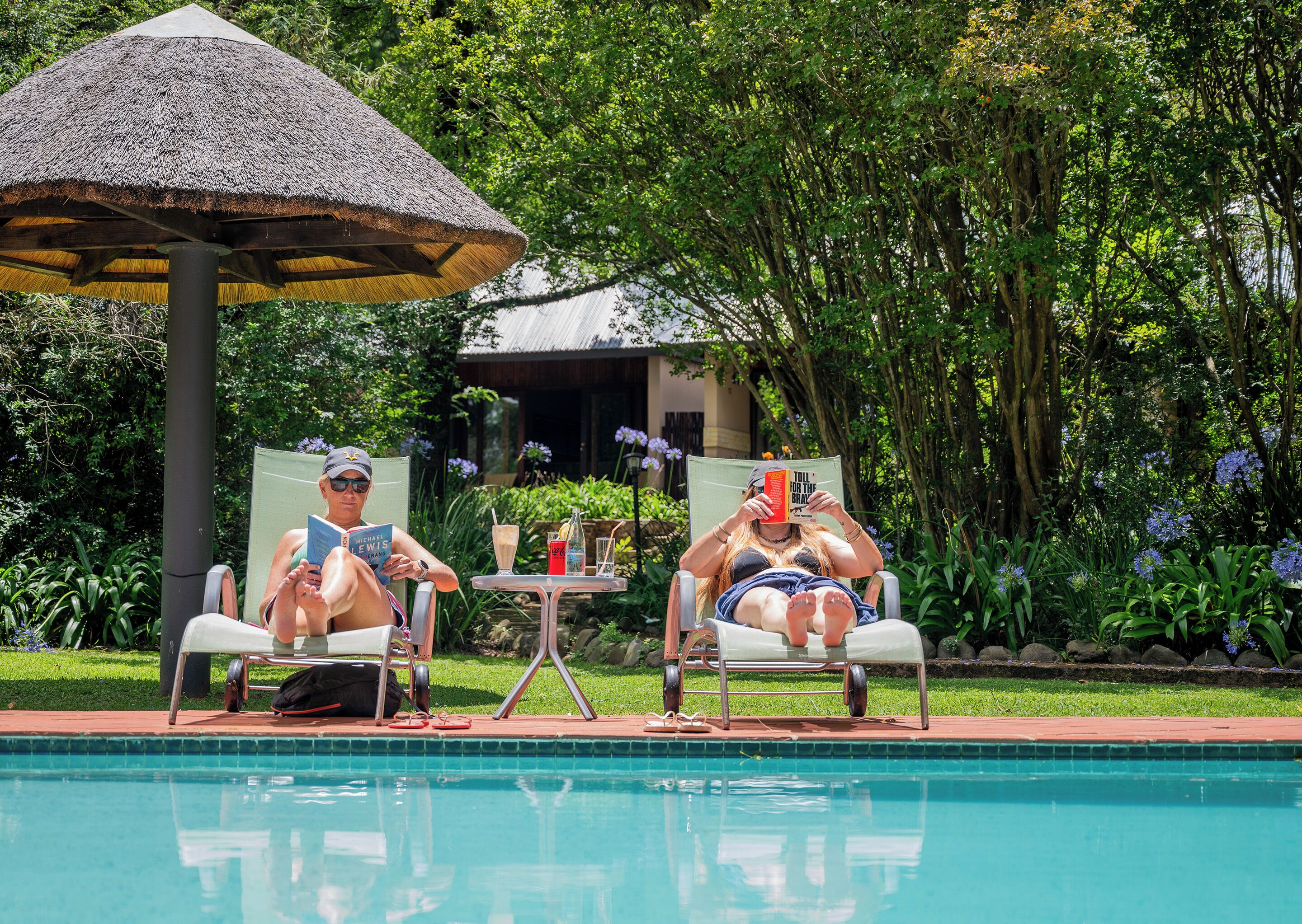 2 outdoor pools, pool umbrellas, pool loungers