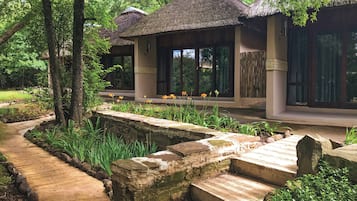 Familiekamer, uitzicht op tuin | Uitzicht op de tuin