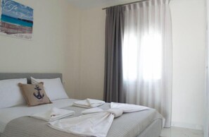 Panoramic-Suite, Mehrere Betten, Meerblick | Bügeleisen/Bügelbrett, kostenloses WLAN, Bettwäsche