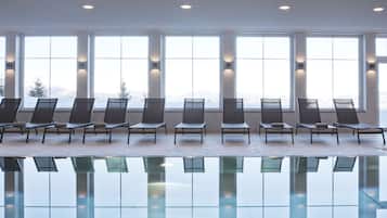 Indoor pool, open 8:00 AM to 8:00 PM, pool loungers