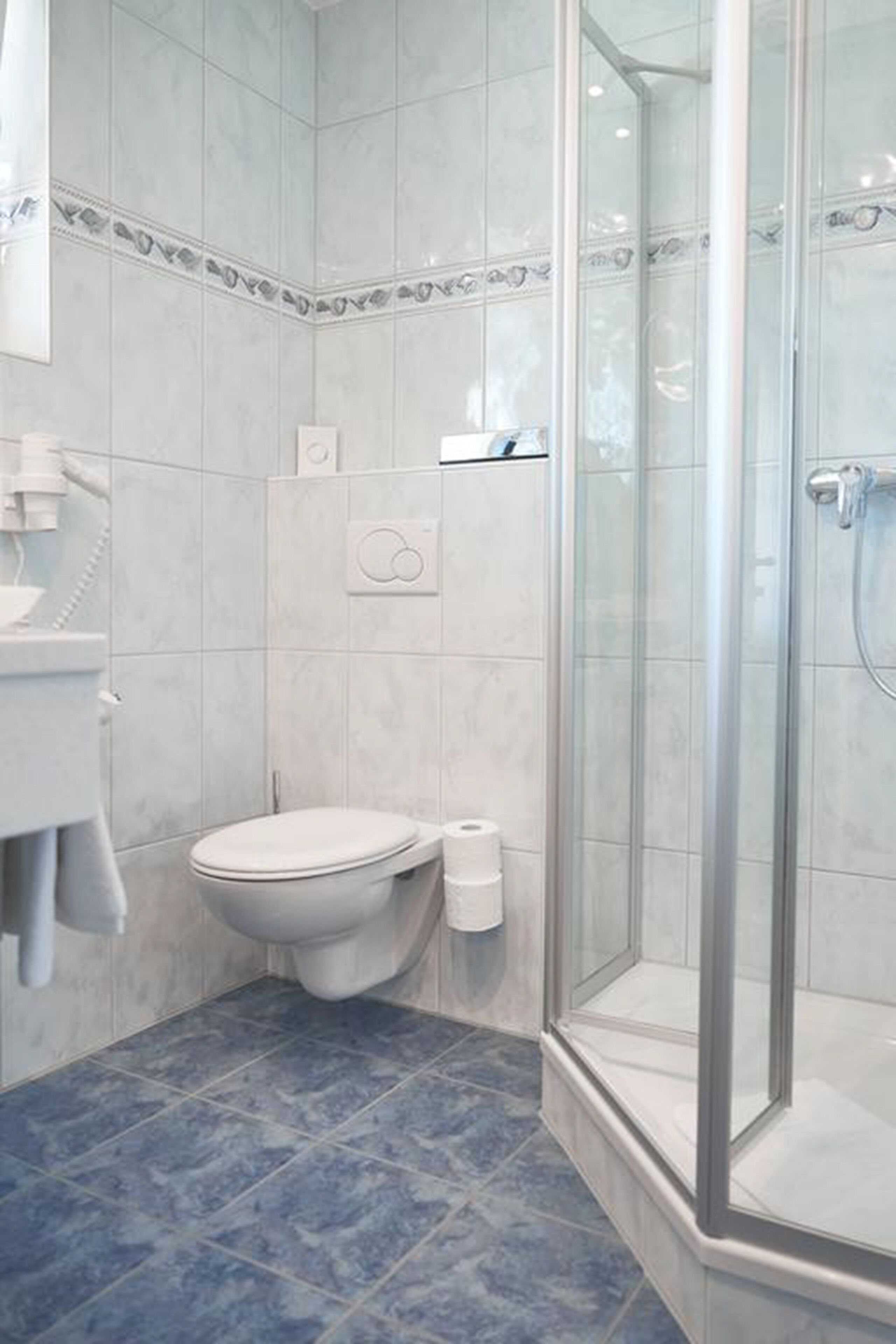 free toiletries, hair dryer, slippers, towels