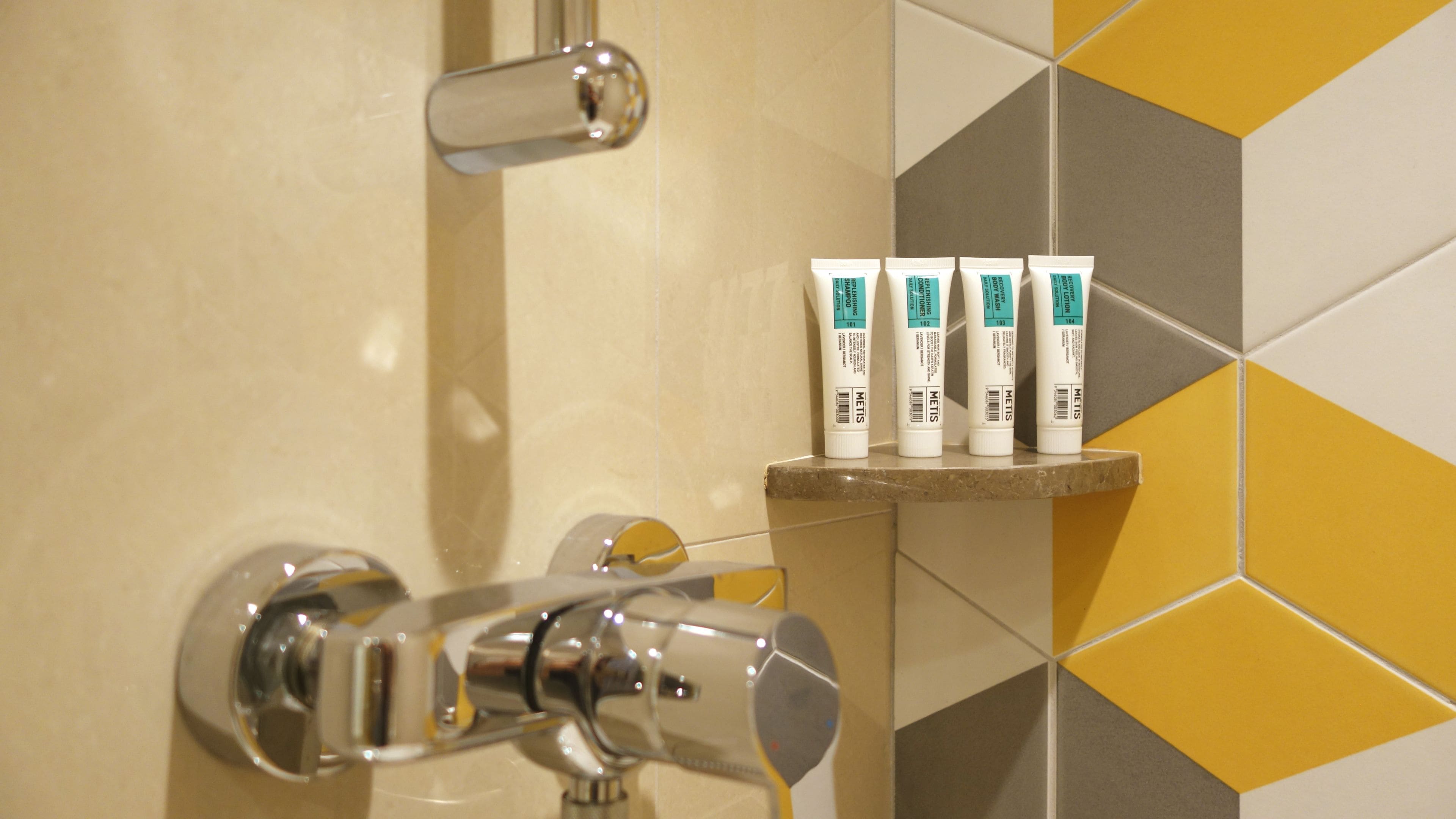 superior room twin bed | bathroom amenities | free toiletries, hair dryer, slippers, towels