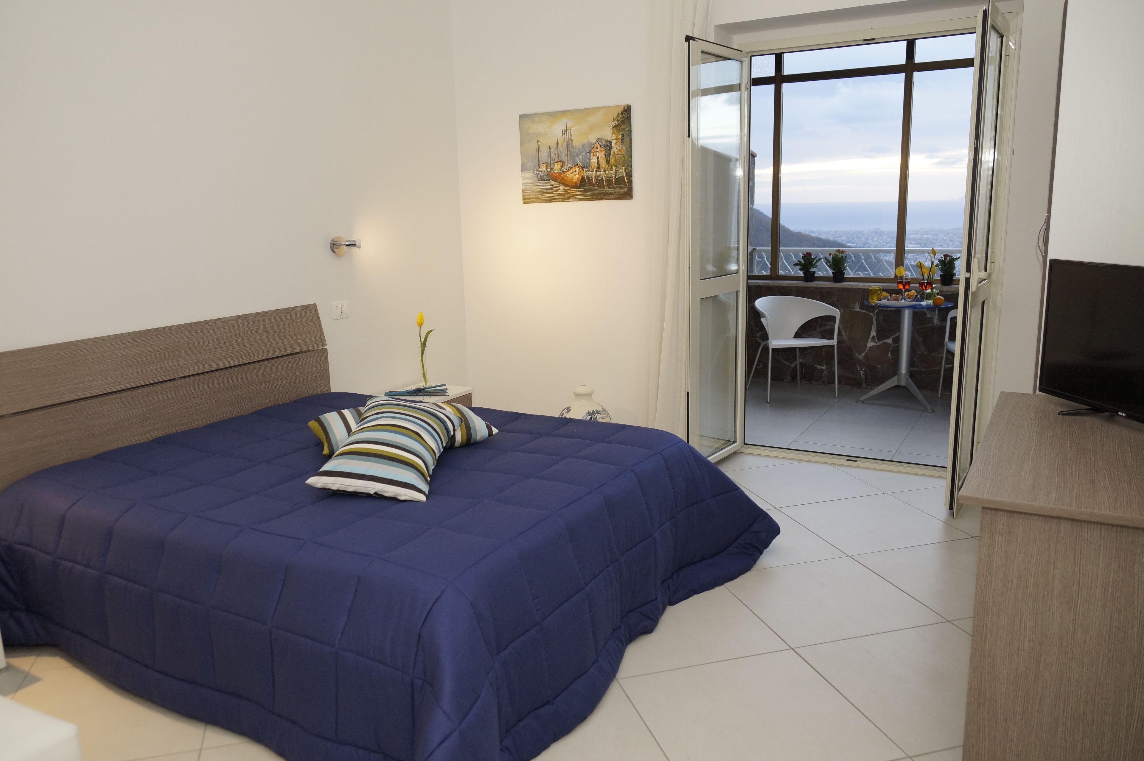 deluxe double room, patio, sea view | hypo-allergenic bedding, desk, blackout curtains, soundproofing