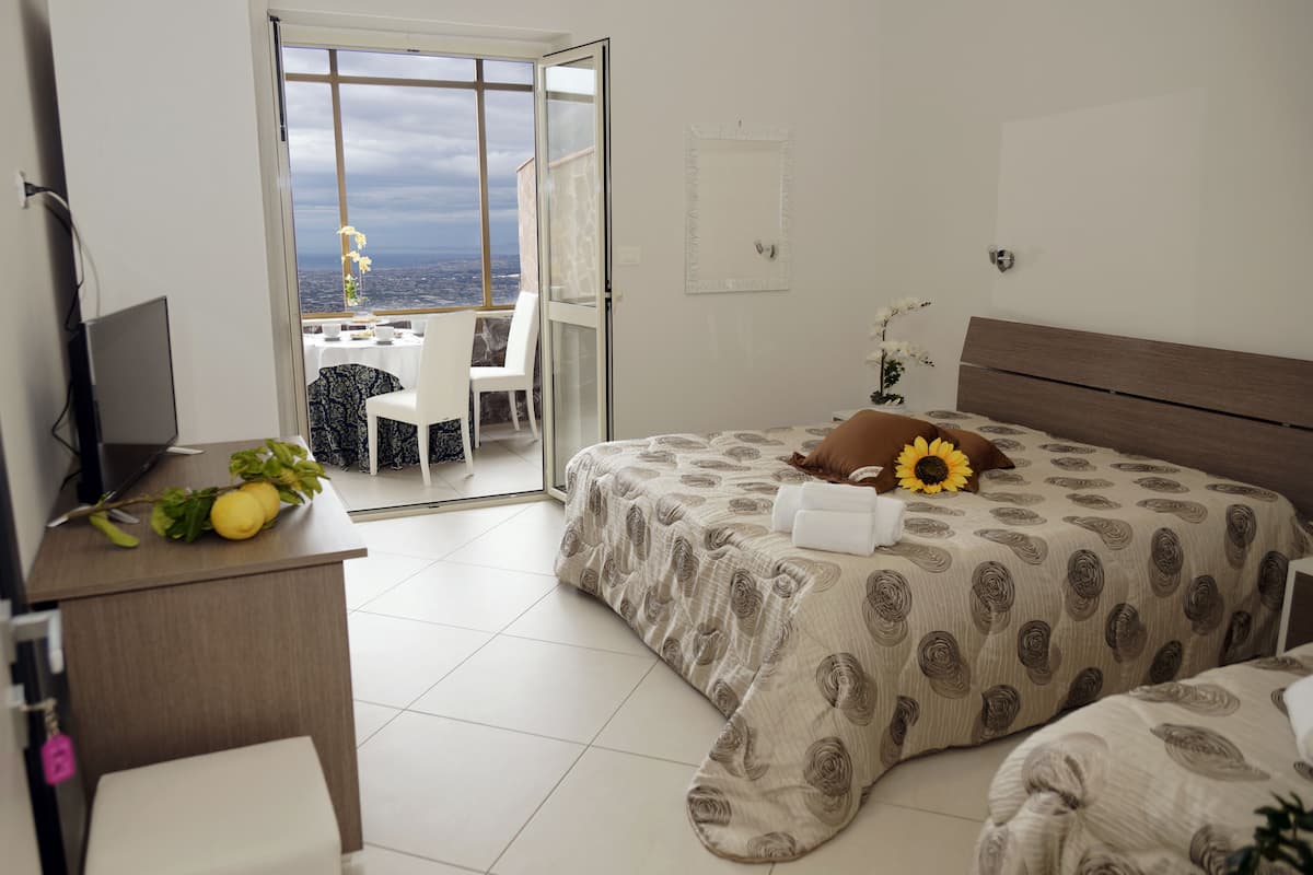 deluxe double room, patio, sea view | hypo-allergenic bedding, desk, blackout curtains, soundproofing