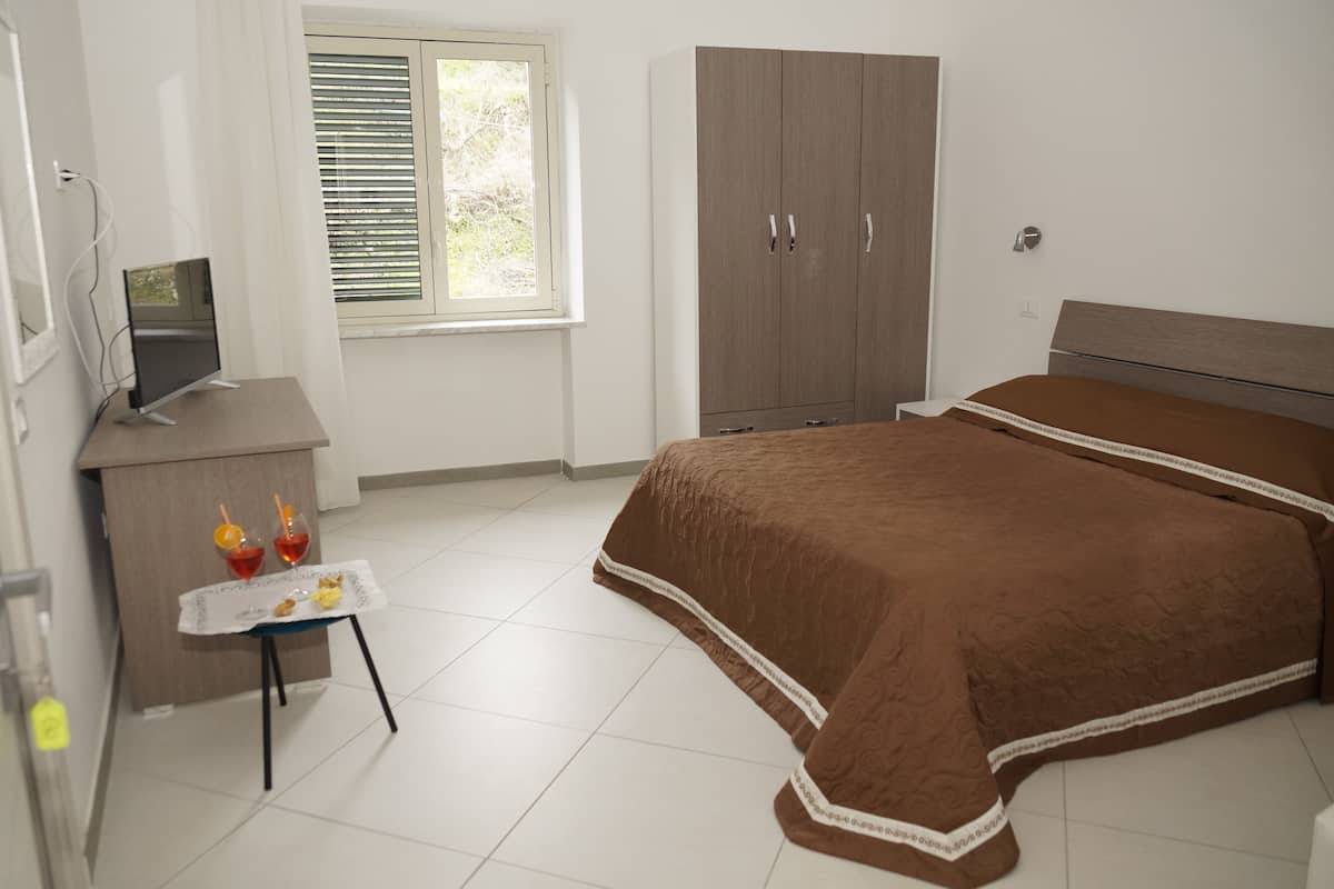 hypo-allergenic bedding, desk, blackout curtains, soundproofing