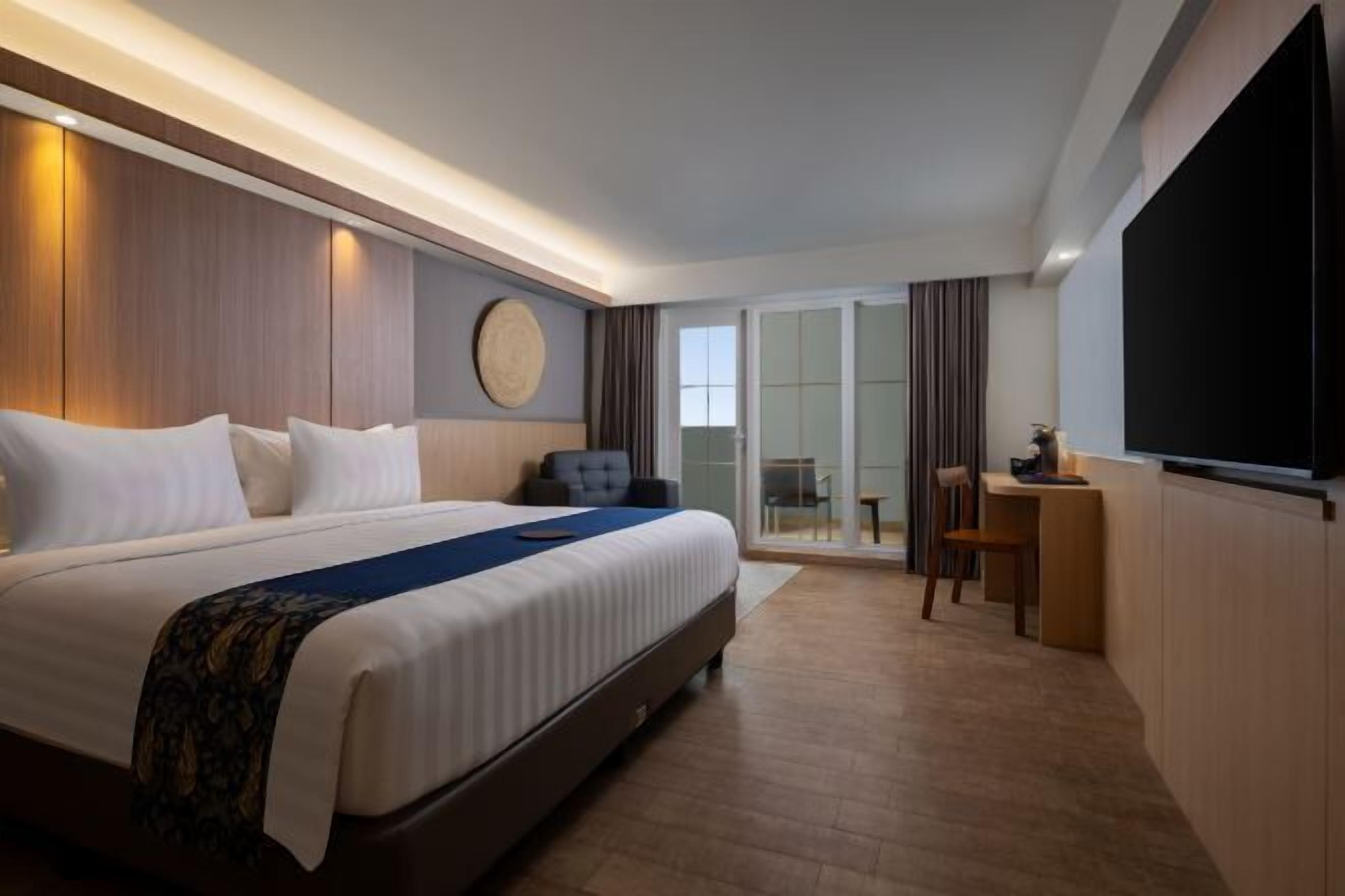 Ropa de cama de alta calidad, minibar, caja fuerte y escritorio