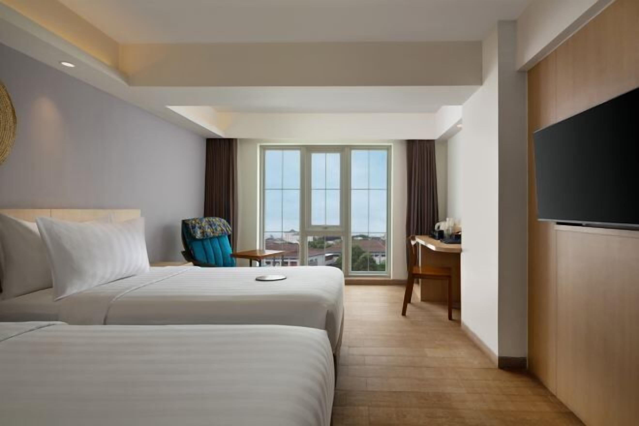 Ropa de cama de alta calidad, minibar, caja fuerte y escritorio