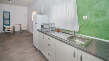 Panoramic Suite, Terrace, Sea View | Private kitchen | Fridge, electric kettle