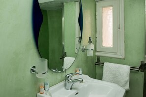 Economy Double Room (Without View) | Bathroom | Shower, rainfall showerhead, slippers, towels