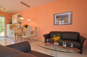 Smart TV, fireplace, DVD player, books