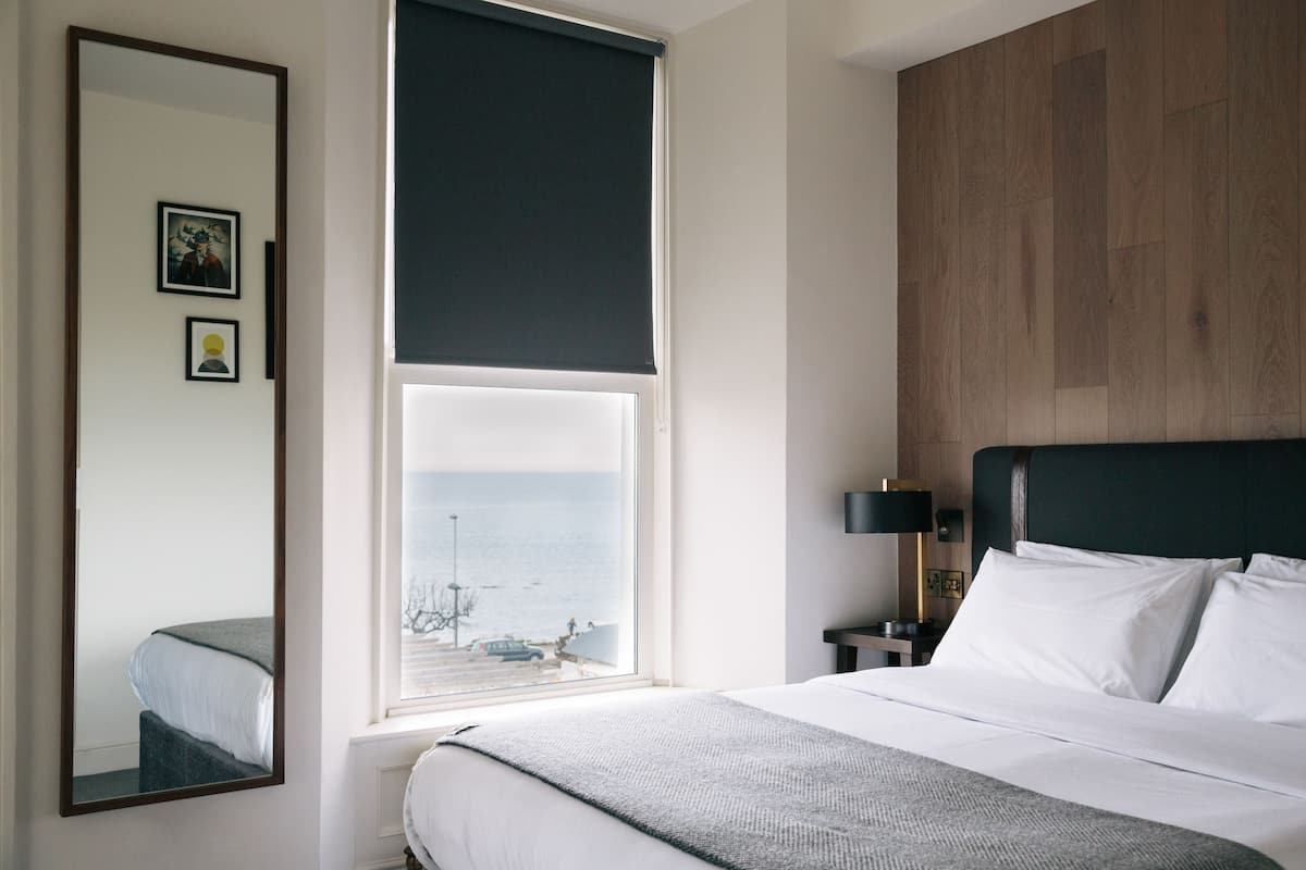 Deluxe Room, 1 Queen Bed, Non Smoking, Sea View | Hypo-allergenic bedding, desk, laptop workspace, blackout curtains